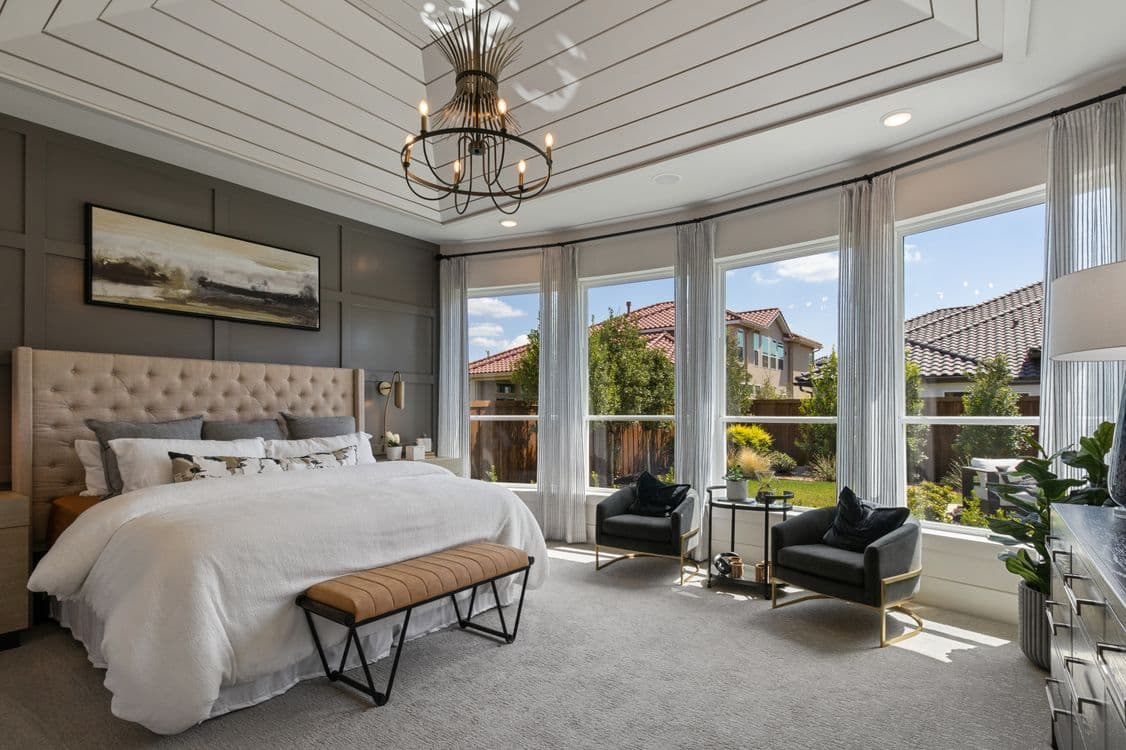 Spacious modern bedroom with elegant furniture