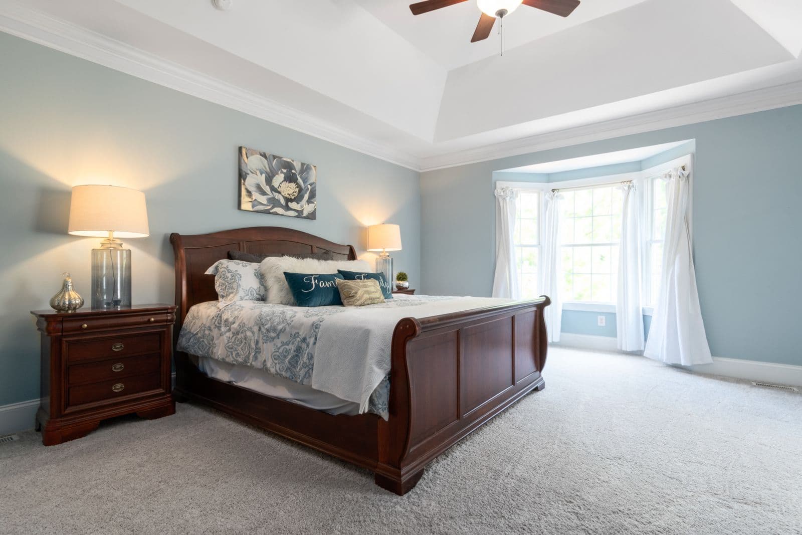 Elegant wooden bed frame in a bedroom