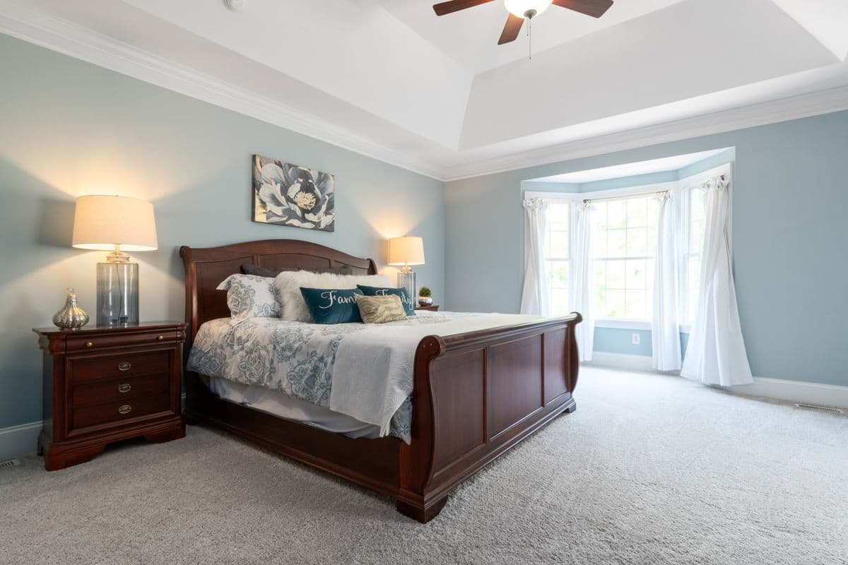 Solid mahogany bed frame with carved headboard