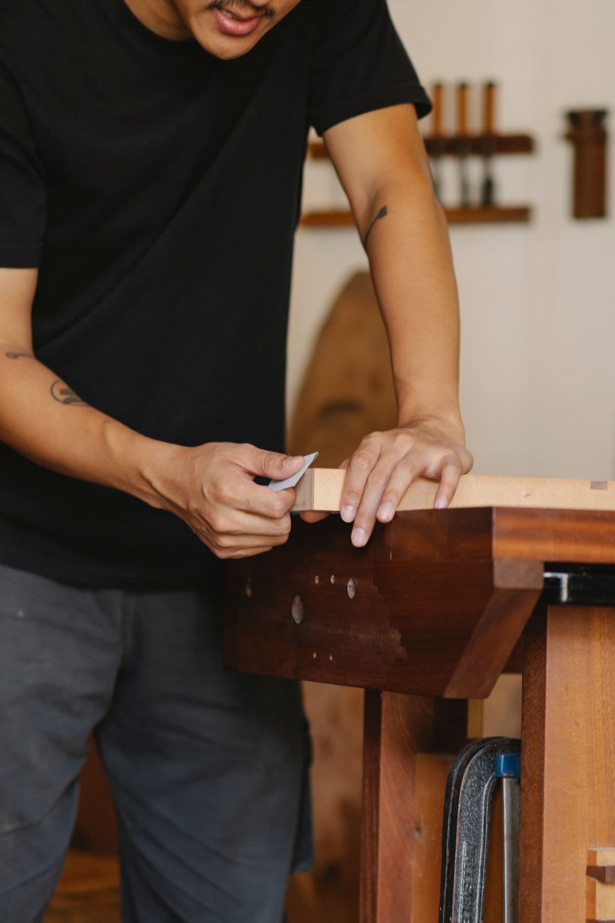 Craftsman repairing wooden furniture